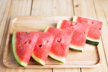 Sliced Red watermelon on wooden board