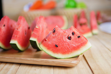 Sliced Watermelon fresh on wooden board and bite