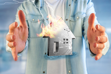 Shinny damaged silver house displayed on a futuristic interface - 3d rendering