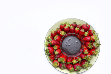 Fresh strawberry and chocolate in bowl