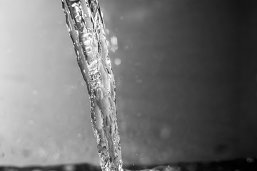 Water flow close, black and white photo