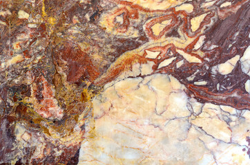 Background texture of red and white marbled stone