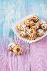 Tasty different cakes set on a color gradient background