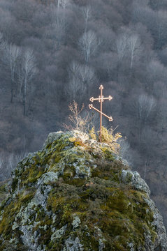 Beautiful old cross in mountain burial