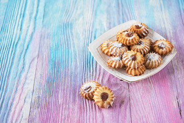 Tasty different cakes set on a color gradient background