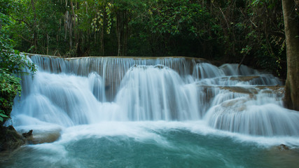 Huay Mae Khamin waterfalls in deep forest at Srinakarin National Park ,Kanchanaburi ,A beautiful stream water famous rainforest waterfall in Thailand