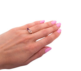 Golden ring with big garnet  and diamonds on woman's hand