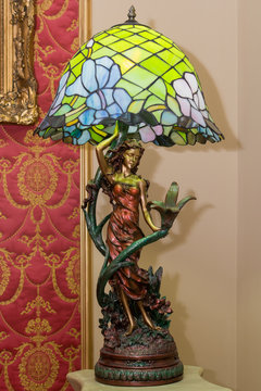 Belgrade, Serbia - November 03, 2017: antique lamp in the shape of a girl