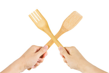 Spoon wood and Fork wood handmade in hand isolated on white background.