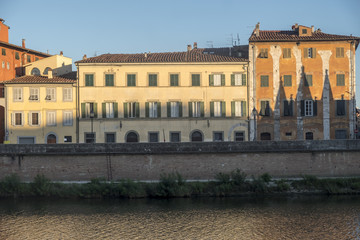Fototapeta na wymiar Pisa, historic buildings along the Arno river
