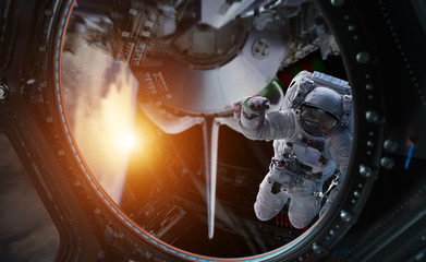 Astronaut working on a space station 3D rendering elements of this image furnished by NASA - obrazy, fototapety, plakaty