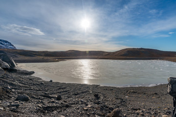 Mountains, valleys, lake and meadow in Iceland