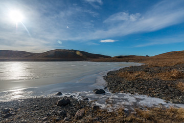 Fototapeta na wymiar Mountains, valleys, lake and meadow in Iceland