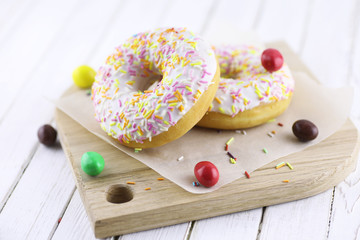 Donut on a wooden white background