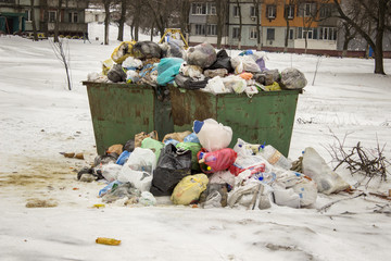 overcrowded garbage cans