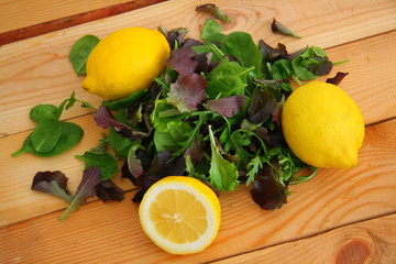 Juicy lemons and colorful salad