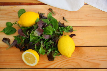 Juicy lemons and colorful salad