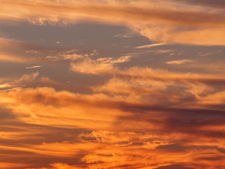Naklejka na ściany i meble Real cloudy sky at sunset background