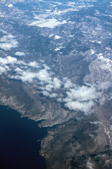 Snow-covered hilly terrain and sea coast, aerial photograph. Novi-Vinodolski, Povile, Klenovica, Croatia