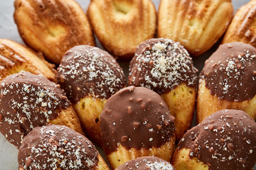 Tasty almond cookies arranged in the shape of fan on white background, close-up, selective focus