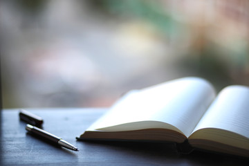 open book and a table
