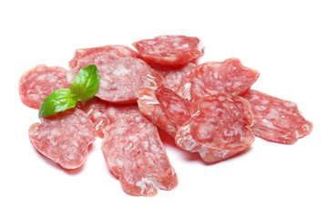 Dried sliced organic salami sausage on white background