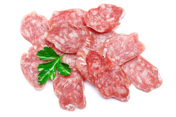 Dried sliced organic salami sausage on white background