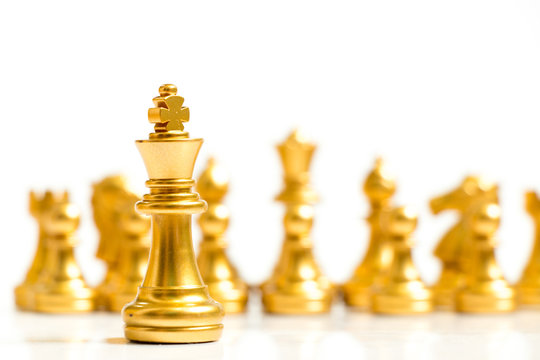 Gold King Chess Piece Stand In Front Of Team On White Background (Concept For Leadership, Management)