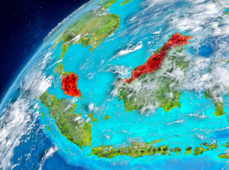 Space view of Malaysia in red