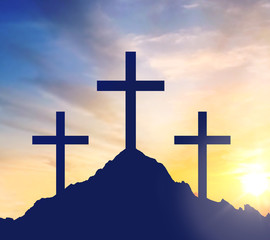 crucifixion, religion and christianity concept - silhouettes of three crosses on calvary hill over...