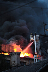 Extinguishing fire from the lift, fire and black smoke..