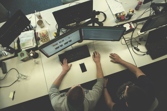 young programmers writing programming code top view
