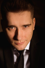 Obraz premium Successful businessman portrait indoor in a modern studio.