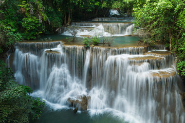 Huay Mae Khamin waterfalls in deep forest at Srinakarin National Park ,Kanchanaburi ,A beautiful stream water famous rainforest waterfall in Thailand