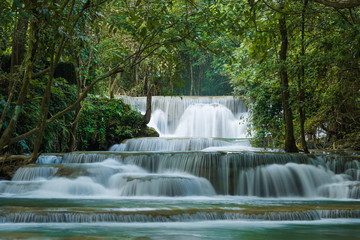 Huay Mae Khamin waterfalls in deep forest at Srinakarin National Park ,Kanchanaburi ,A beautiful stream water famous rainforest waterfall in Thailand