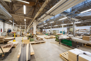 production, manufacture and woodworking industry concept - furniture factory workshop