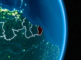 French Guiana in red at night