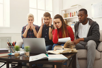 Group of diverse students studying at home atmosphere on the couch