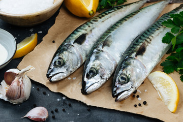 Fresh mackerel fish with ingredients to cook