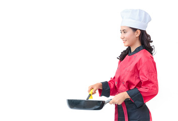 Smiling chef woman in red uniform holding cooking utensils