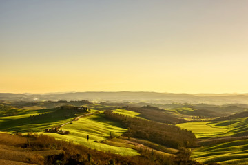View of the tuscan countryside in spring at sunset