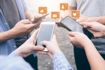 Group of young teen using mobile phones.