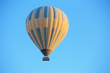 Hot air balloons in the blue sky, active leisure or adventure of a dream concept.