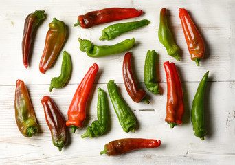 peppers of various colors on the table