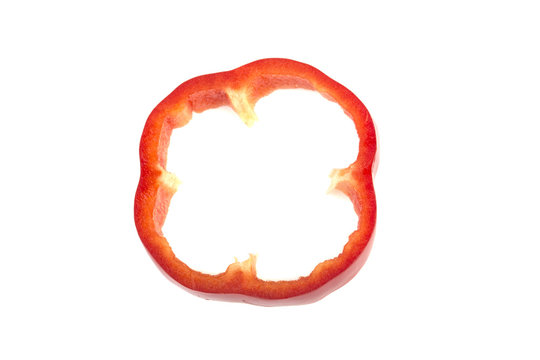 red sweet peppers cut on white background