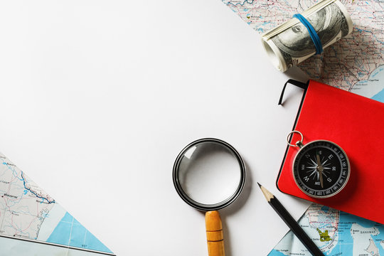 Travel Stationery Mockup. Paper, Magnifier, Map, Compass, Money Notebook And Pencil. Flat Lay.