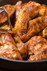 Baked wings, served with dip or baked potatoes.