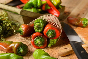 peppers of various colors on the table