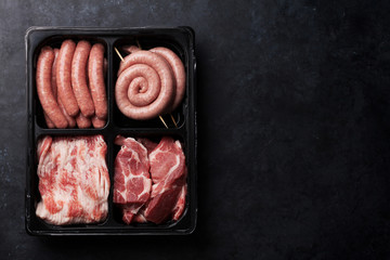 Raw meat and sausages