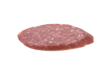 sausage sliced in thin slices isolated on white background